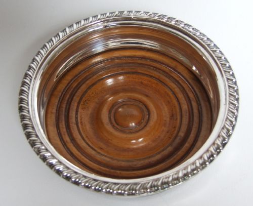 A Regency Style Edwardian Silver Plated Wine Bottle Coaster.