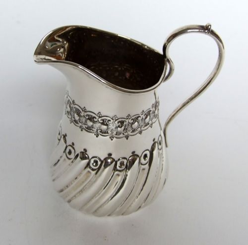 fig 1. A lovely Victorian silver cream jug.