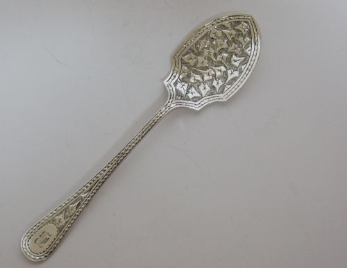 A Handsome Victorian Engraved Silver Preserve Spoon.