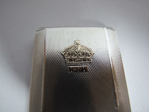 fig 2. A rare, collectable silver & gold George VI match book holder.