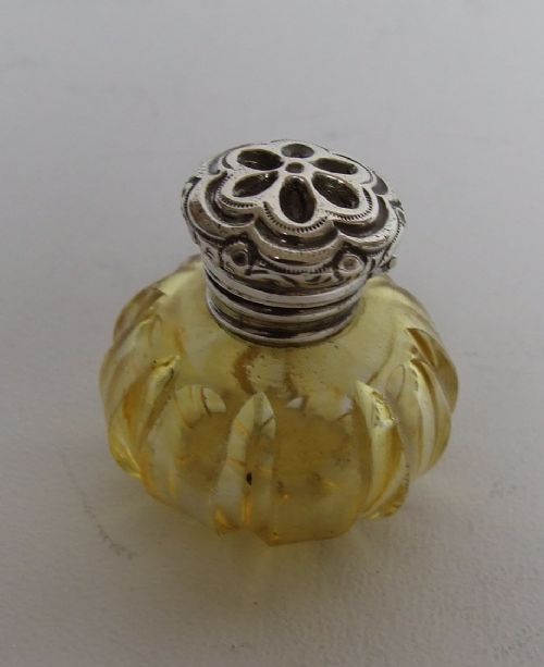 A Charming Victorian Silver Mounted Citrine Perfume Bottle.