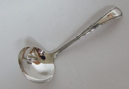 A First World War Silver Cream Ladle.