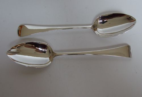 Handsome Pair of George III Silver Serving Spoons.