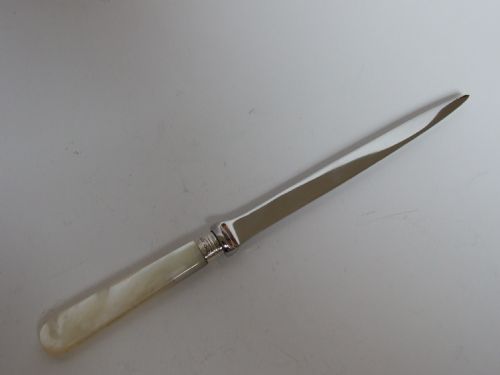 An Attractive Mother-of-pearl Handle Letter Opener with Silver Ferrule.