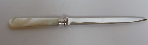 fig 1. An attractive mother-of-pearl handle letter opener with silver ferrule.