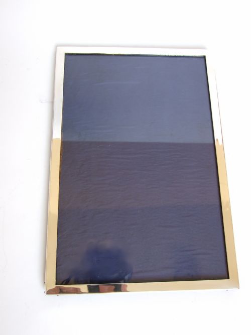 A Large Silver Portrait/landscape Photo Frame.