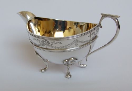 A Superb Edwardian Silver Gilt Cream Boat.
