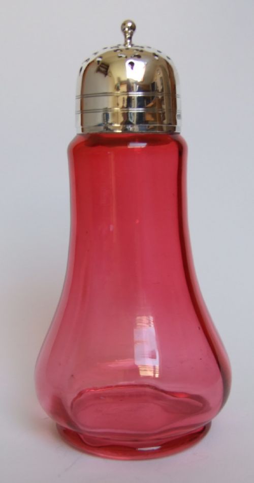 A Delightful Edwardian Silver and Cranberry Sugar Caster.