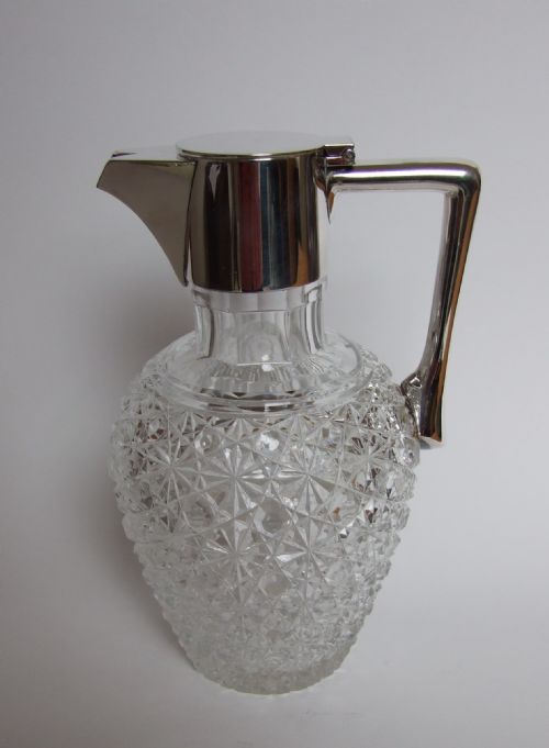 A Gorgeous Victorian Silver Plated and Cut Glass Claret Jug.