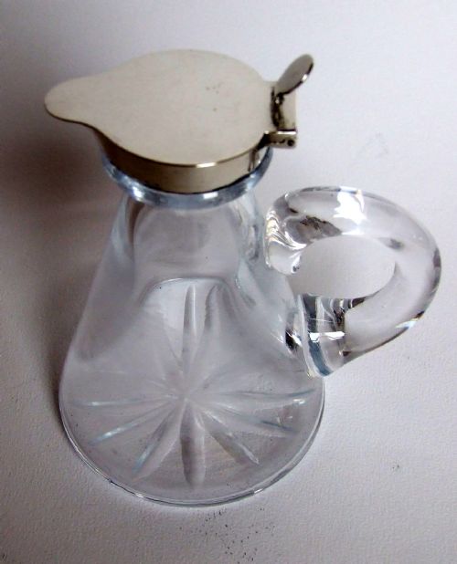 fig 1. An Edwardian silver mounted chotopeg or Whisky tot.