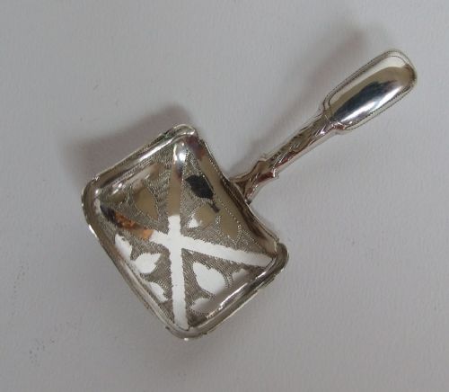A Gorgeous George IV Silver Caddy Spoon.