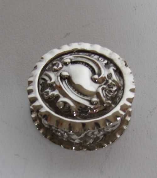 A Victorian Silver Pillbox with Hinged Lid.
