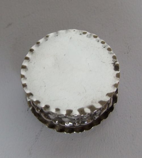 fig 1. A Victorian silver pillbox with hinged lid.