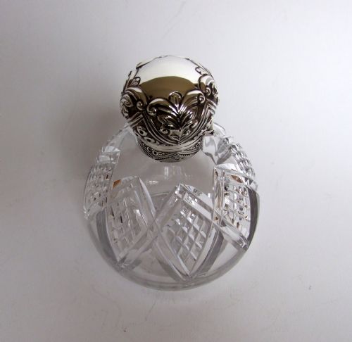 fig 1. A superb Edwardian silver mounted cologne bottle.