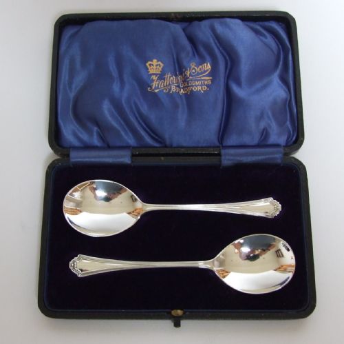 A Delightful Boxed Pair of Silver Preserve Spoons.