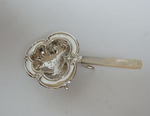 A Gorgeous Silver and Mother-or-pearl Tea Strainer.