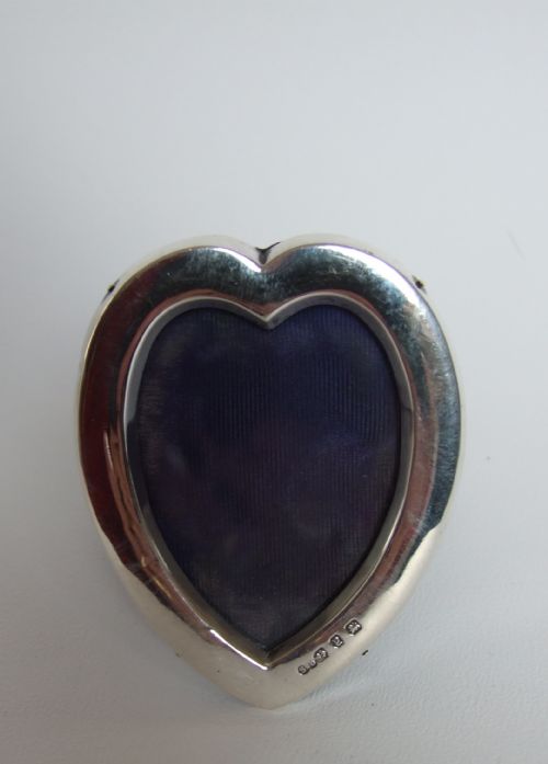 fig 1. A lovely Victorian heart shaped small silver photo frame.