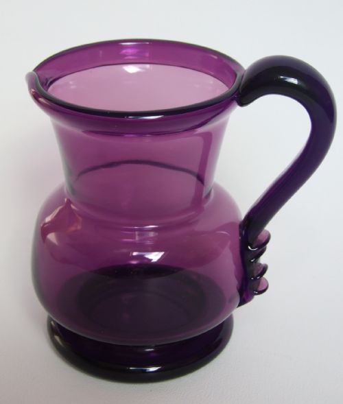 A Rare Early Victorian Amethyst Cream Jug