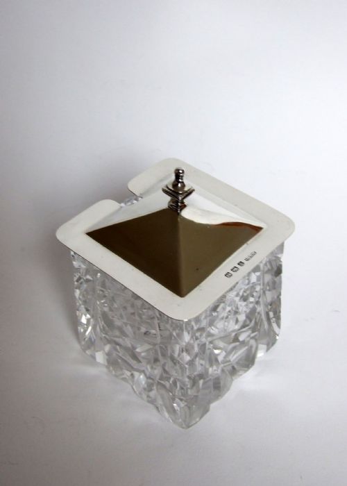 fig 1. An unusual silver lidded 'pagoda' style preserve jar.