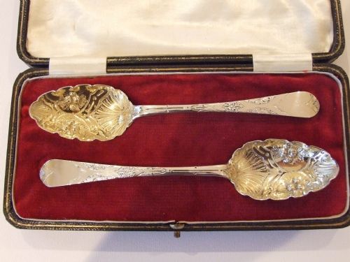A Wonderful Pair of Boxed Newcastle Silver Gilt Fruit Spoons.