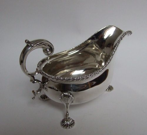 A Handsome Edwardian Silver Gravy Boat.