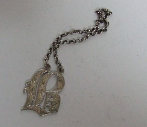A Superb Early Victorian Silver Brandy Label.