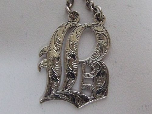 fig 1. A superb early Victorian silver Brandy label.