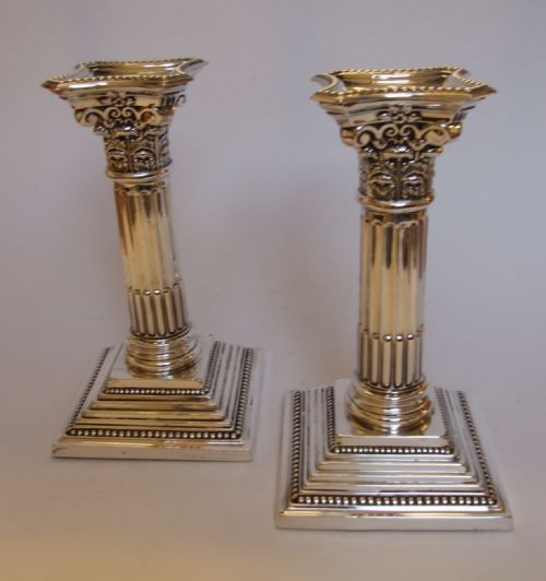 A Fabulous Pair of First World War Silver Candlesticks.