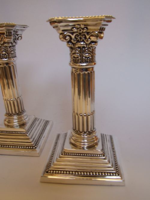 fig 1. A fabulous pair of First World War silver candlesticks.