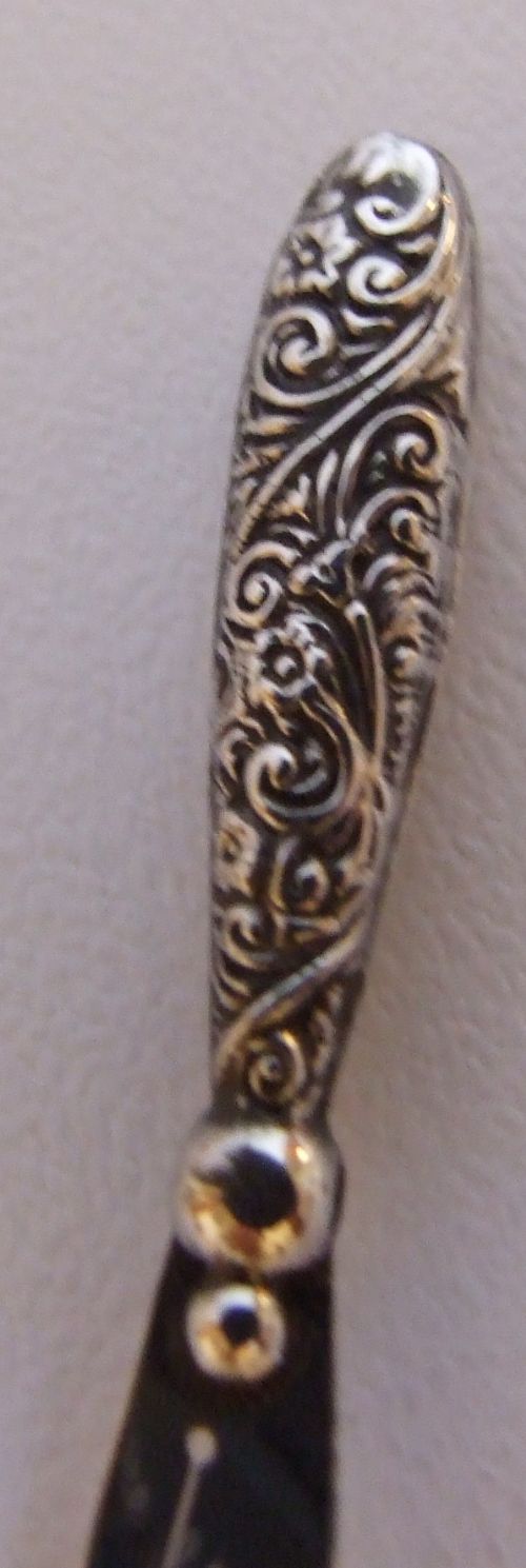 fig 1. A charming Edwardian silver 'sword' bookmark.