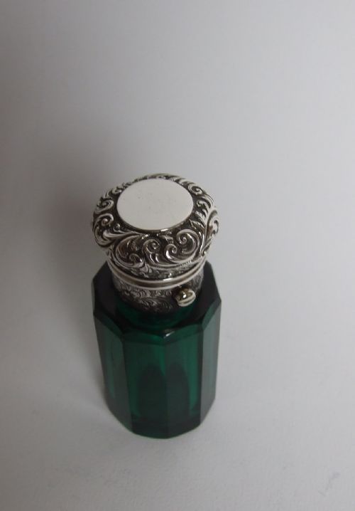 fig 1. A stunning Victorian silver mounted perfume bottle.