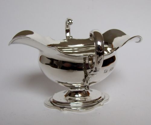 fig 1. A handsome Edwardian silver gravy or sauceboat.