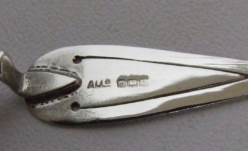 fig 1. A lovely silver trowel bookmark.