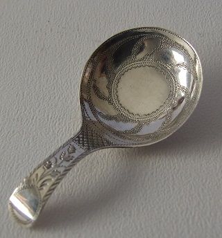 A Gorgeous Georgian Silver Caddy Spoon.