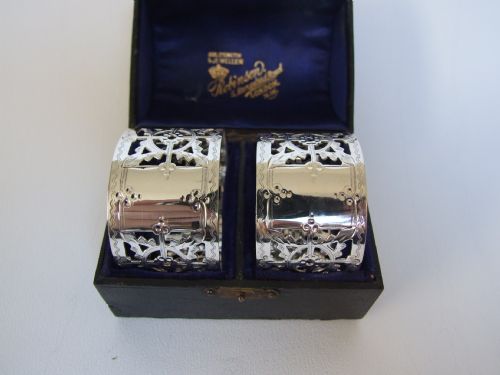 fig 1. A gorgeous pair of Victorian pierced silver napkin rings in the original box.