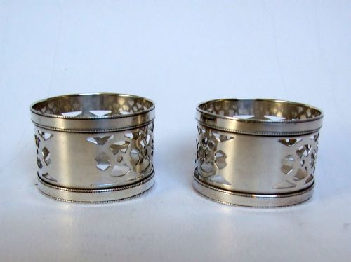A Good Pair of George V Pierced Silver Napkin Rings.