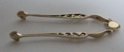 fig 1. A gorgeous pair of silver gilt tongs.