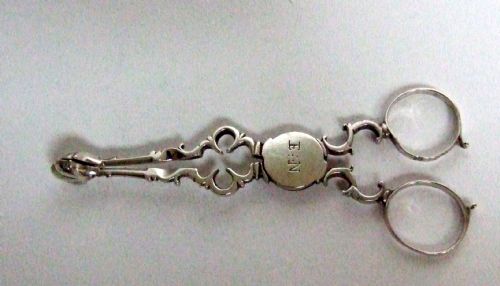 fig 1. A pair of 18th Century quatrefoil silver tea tongs.