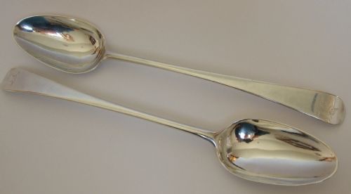 A Rare Pair of Early George III Silver Stuffing Spoons.