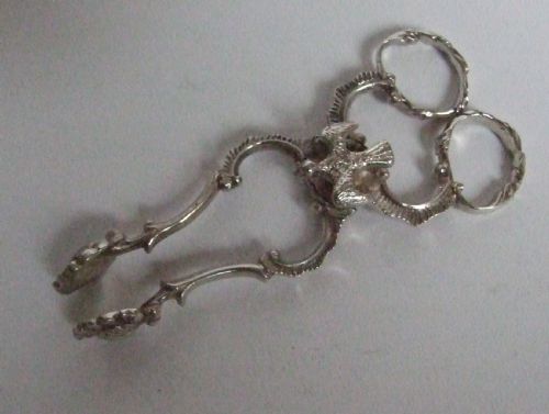 An Unusual Pair of Silver Tea Tongs.