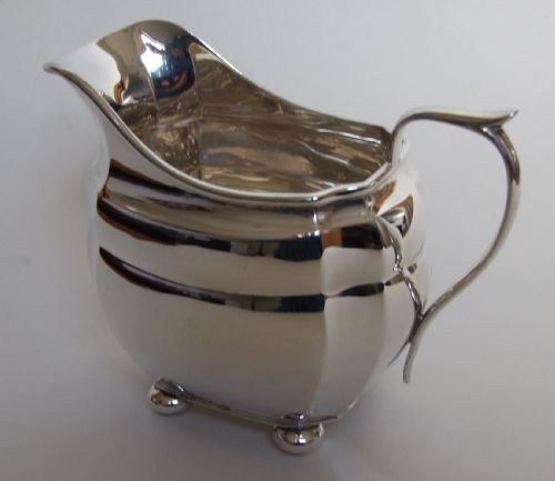 A Handsome Art Deco Silver Cream Jug.