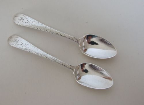 An Unusual Pair of Silver Fancy Back Teaspoons.
