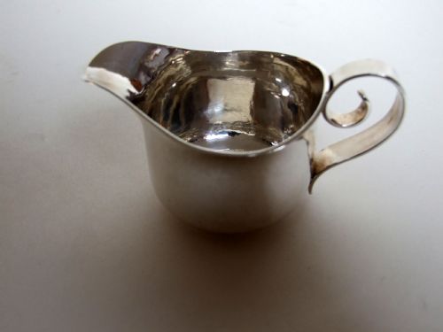 A Fabulous Britannia Standard Silver Cream Jug in the Arts & Crafts Style.
