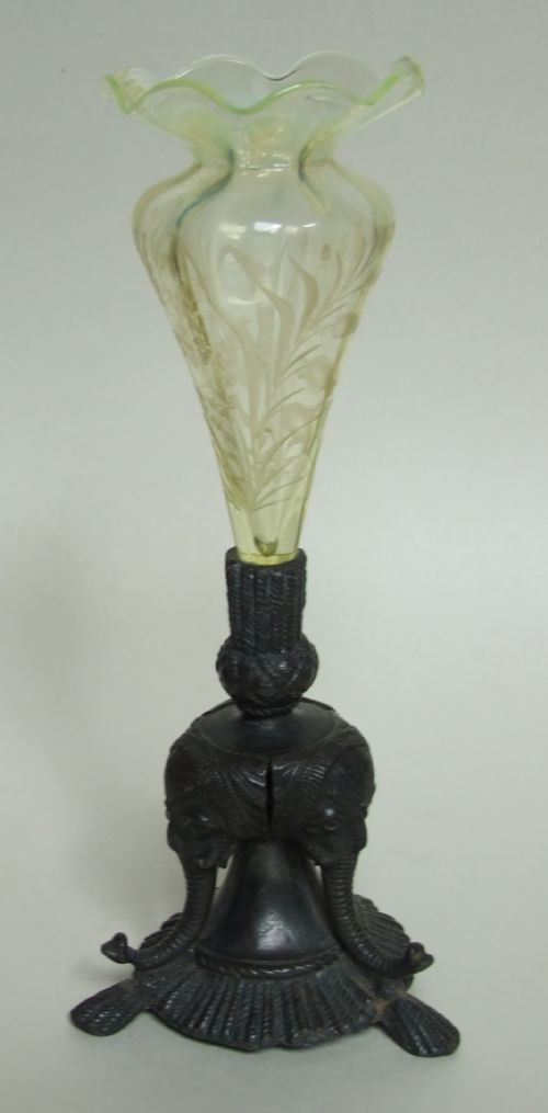 A Gorgeous Vaseline Glass Epergne with Elephant Base.