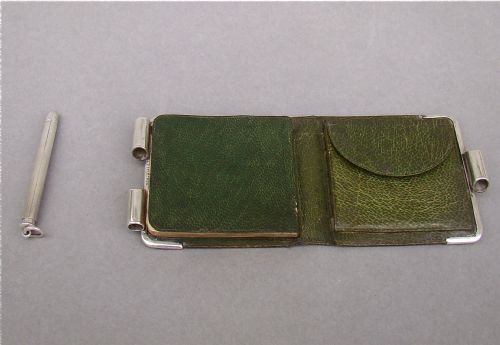 fig 2. An exquisite Victorian silver mounted aide memoire/coin purse.