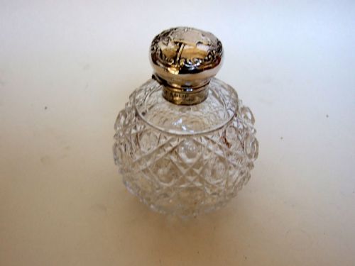 A Fine Edwardian Silver Topped Cologne Bottle