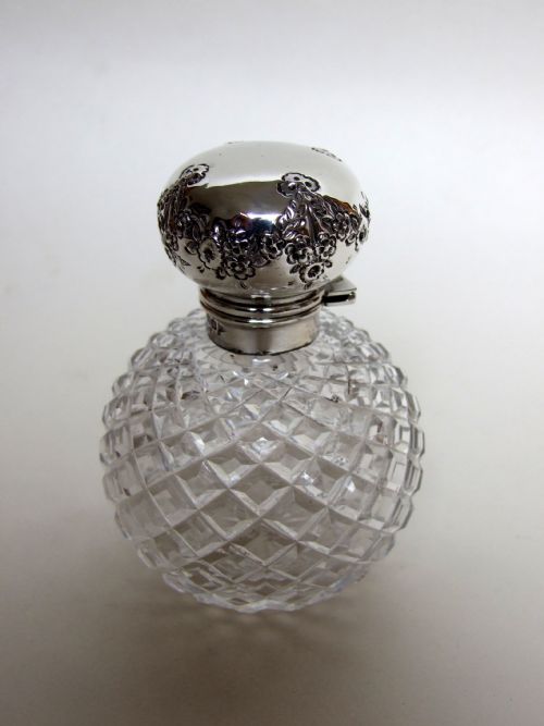 A Gorgeous First World War Silver Mounted Cologne Bottle.
