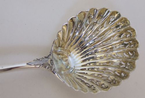 fig 1. A fabulous mid 18th Century silver sifter spoon.