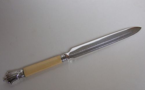 A Victorian Silver Mounted Wedding Cake Knife.