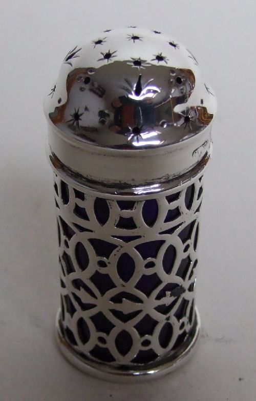 A Pierced Victorian Silver Pepper Pot.